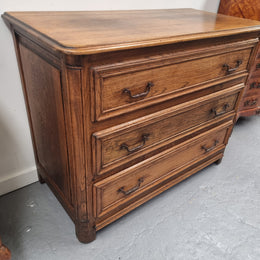 French solid Oak Louis 14th style chest of three drawers. It has three large spacious drawers and it has been sourced from France. It is in good original detailed condition.