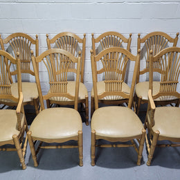 French country style set of six dining chairs and two carvers with leather seats. They are all in good original detailed condition.