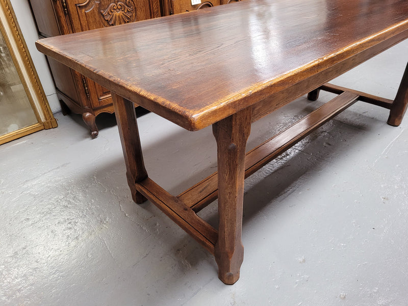 French oak stretcher base refectory table. It has been sourced from France and is in good original condition. Please see pictures to form part of the description.