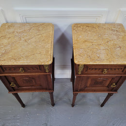 French Oak pair of Louis 16th style marble top bedsides with stunning bronze mounts. They have been sourced from France and are in good original detailed condition.