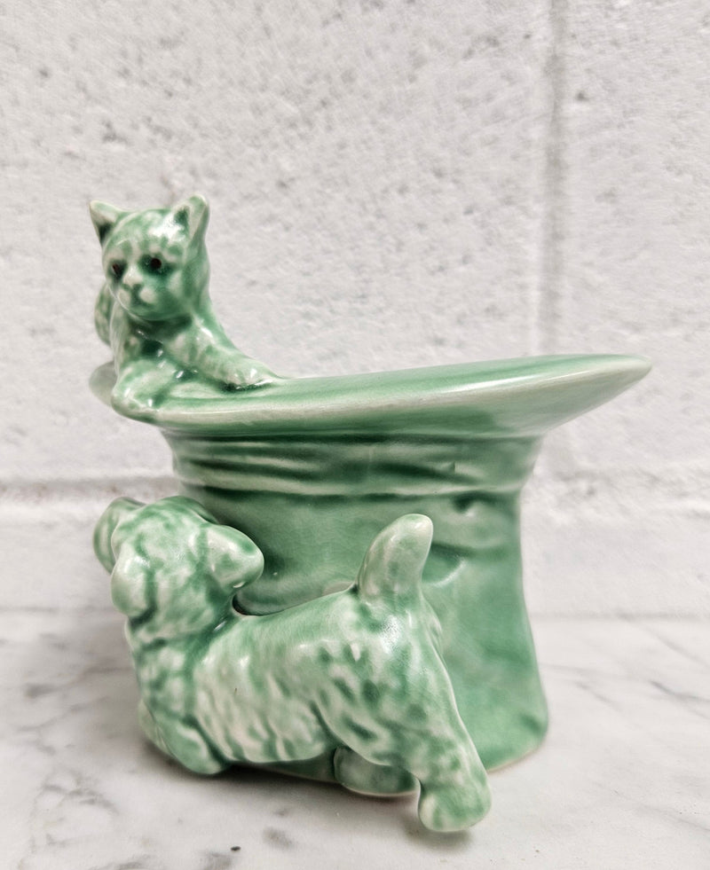 Vintage Sylvac number 1484 green cat and dog playing on top hat. Very cute and in very good condition, no chips or cracks. Please see photos as they form part of the description.