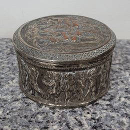 Unusual Antique silver over pottery Italian trinket box nicely decorated with Cherubs. It is in good original condition, please view photos as they help form part of the description.