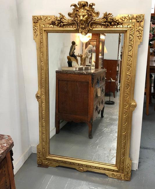 French 19th century restored gilt mirror a highly decorative French 19th Century fully restored gilt mirror. The mirror is its original mirror and contains beautiful original character. This mirror would look amazing on top of a commode or hanging by itself on the wall. In very good restored condition.