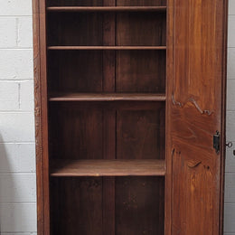 French Oak "Bonnetiere" cupboard of pleasing small proportions. It has four adjustable shelves and plenty of storage space