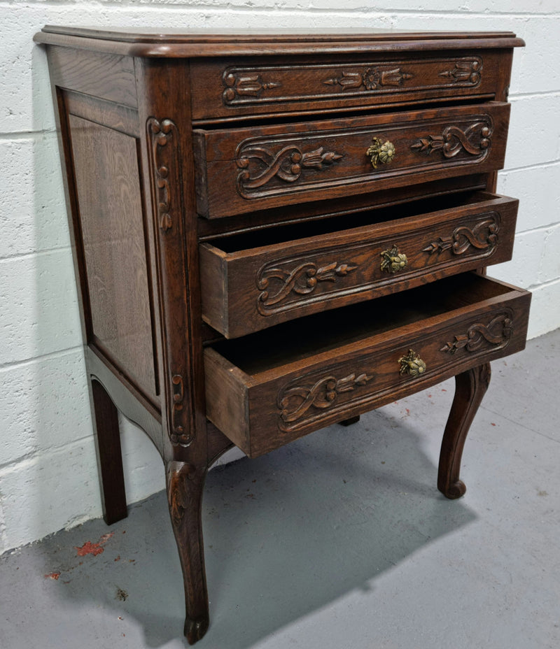 Lovely French dark oak chest of 3 drawers with beautiful carving and details. In good original detailed condition.