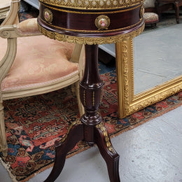 Elegant French louis XVI revival style round marble top side table with ceramic features and ormolu decoration. It is in good original detailed condition and has been sourced from France.