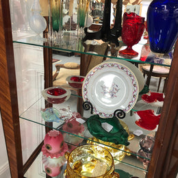 A Louis XV style Kingwood vitrine with marble top. It has beautifully floral inlay with ormolu mounts.