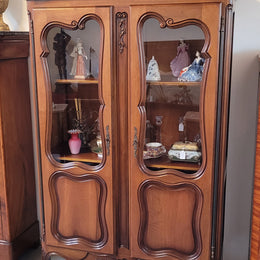 French Walnut Louis XV Style two half glass, door bookcase with three adjustable shelves. Sourced from France and in good original detailed condition.