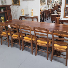 French style reclaimed Elm Farmhouse table with stretcher base and amazing carving underneath. Table can sit 10-12 people and is in good original detailed condition.