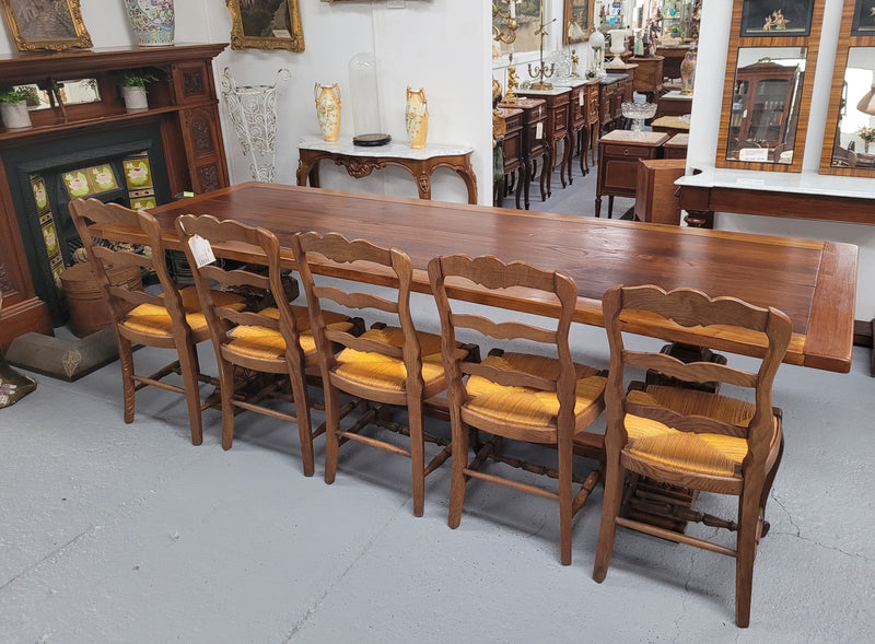 French style reclaimed Elm Farmhouse table with stretcher base and amazing carving underneath. Table can sit 10-12 people and is in good original detailed condition.