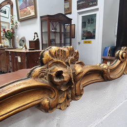 French Louis XV style wood carved and gilded mirror. Mirror is original and showing signs of age. It has been sourced from France and  in good original condition.