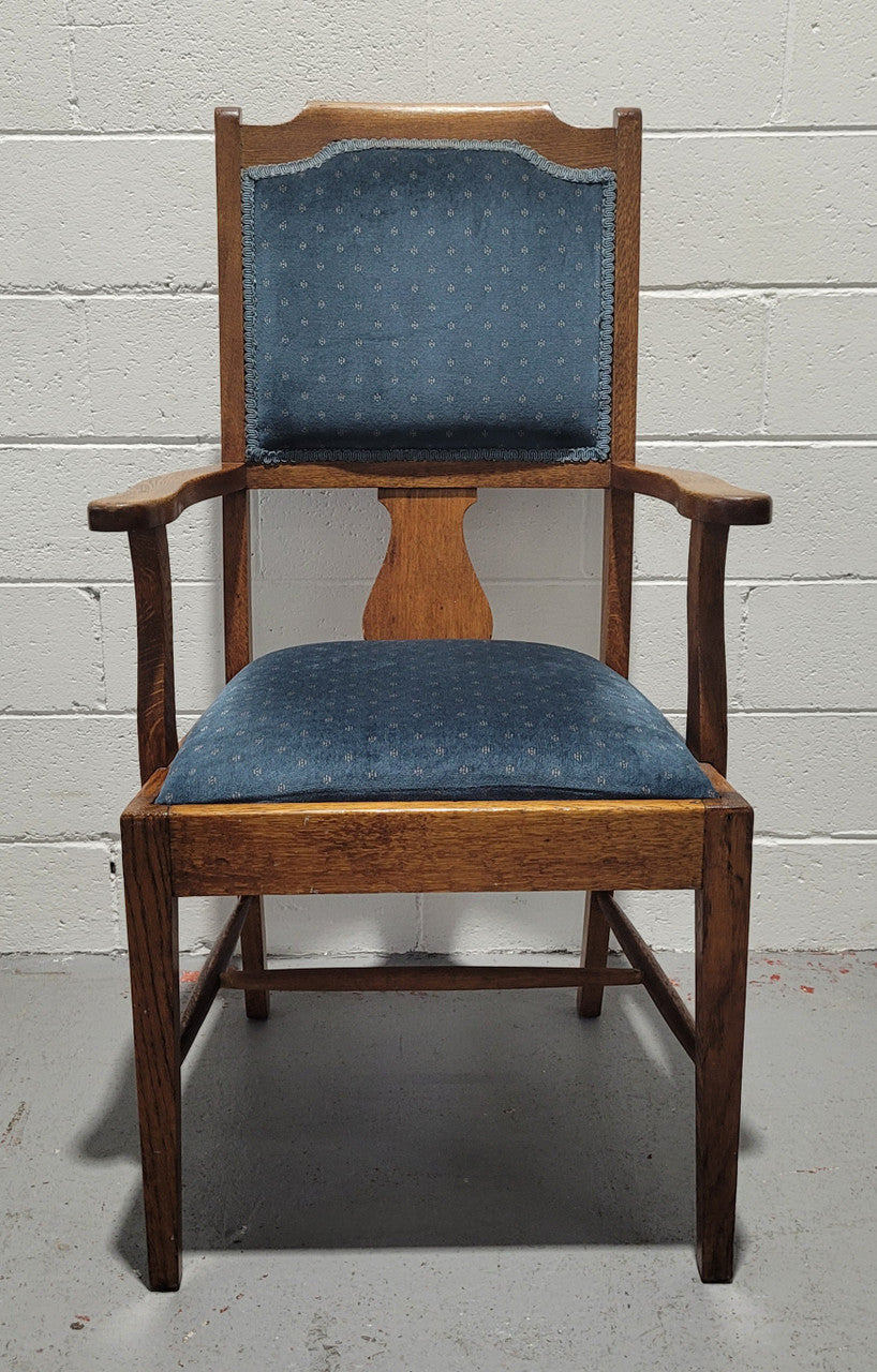 Arts and crafts style blue upholstered armchair. In good original detailed condition.