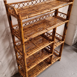 Vintage Tortoiseshell Bamboo Shelves.  Good size unit with irregular shelves. It is in good original condition and it very solid.