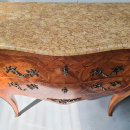 French marquetry inlaid Kingwood marble top commode. It has two drawers and beautiful mounts. Is in good original detailed condition.