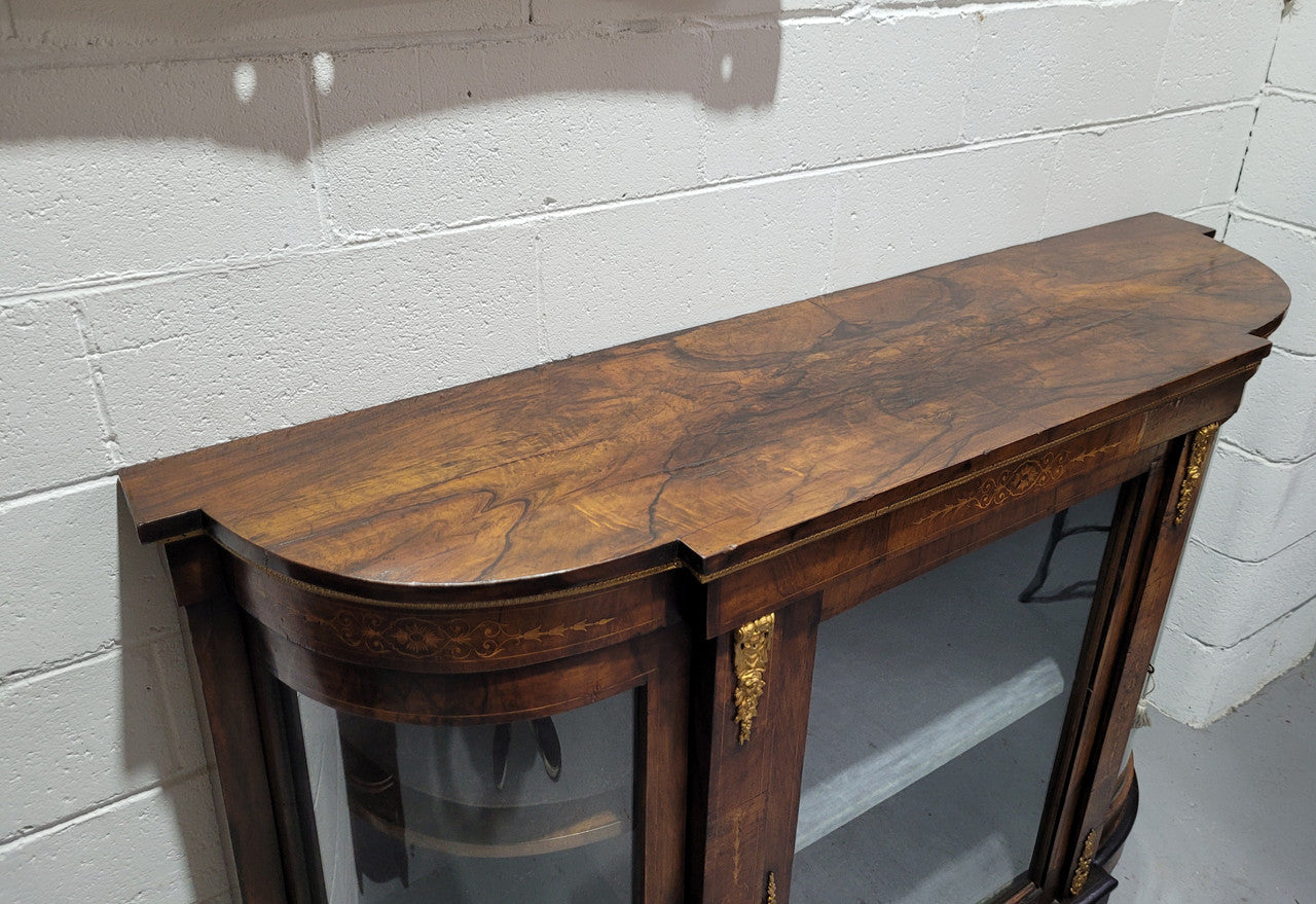 Victorian Rosewood inlaid side cabinet/credenza with velvet lined shelves and gilt mounts. It has been sourced locally and is in good original condition with loads of character.