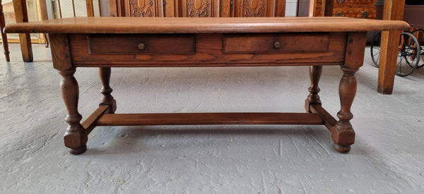 Fabulous Rustic French Oak coffee table with two drawers. It is in good original detailed condition.