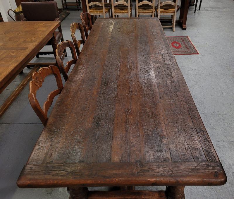 Amazing 2.65 meter French Elm Refectory dining table with loads of rustic charm. This table has been sourced from France and can comfortably seat ten people. It is in good original detailed condition.