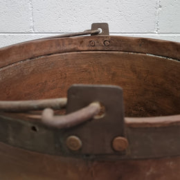 Large Antique French copper cauldron with metal band around rim. It is in good original condition.