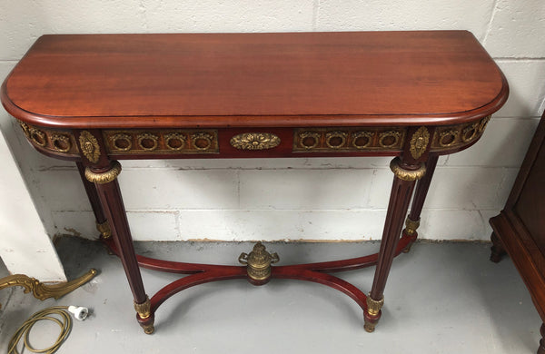 Fully restored decorative French style mahogany console table, with beautiful ormolu mounts and in very good condition.