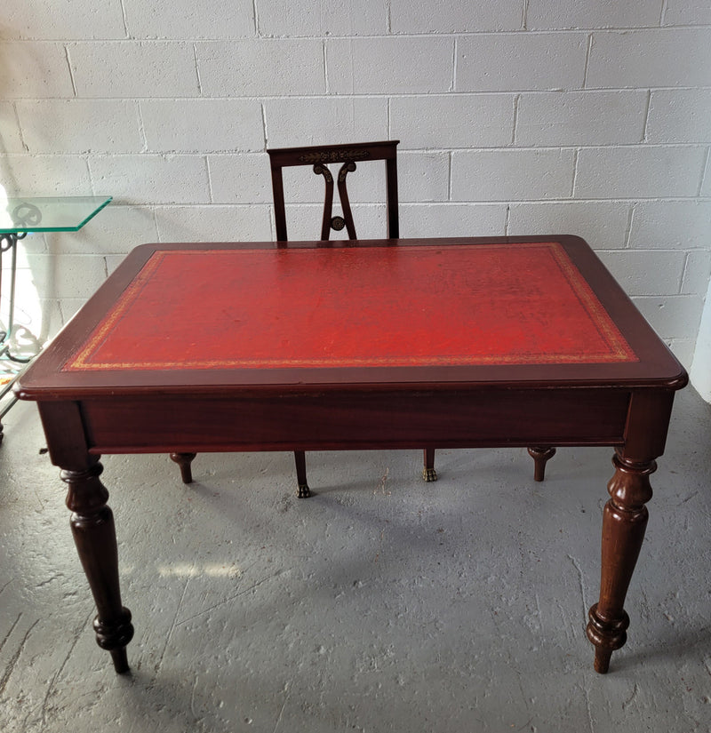 Victorian Cedar two drawer tooled leather topped desk with turned legs. In good original condition.