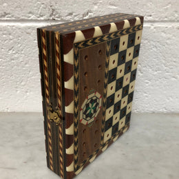 Vintage inlaid folded chess board box with pieces inside. In good clean original condition.