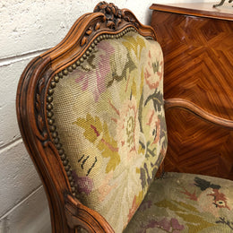 Pair of French Walnut Tapestry covered armchairs. They are in good original detailed condition. Slight wear and tear to fabric but still in good condition please view photos.