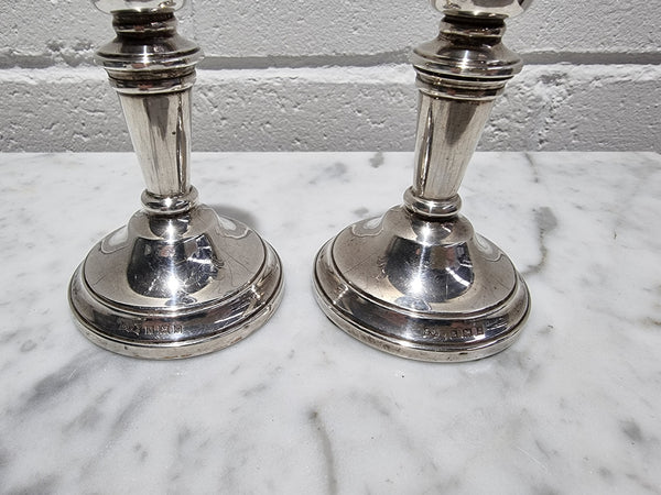 Pair of Birmingham sterling silver candlesticks date marks 1967. In good original condition, please view photos as they help form part of the description.