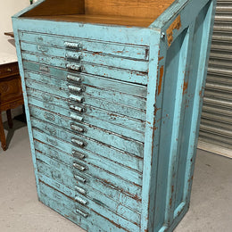Fabulous set of vintage painted blue printers drawers that have adjustable separators which can be taken out for large papers. The drawers are various sizes and there is a section on top for working on or for storing brushes or tall items . These would be perfect for artists or jewellery pieces or even architects. Such a beautiful piece of industrial furniture.
