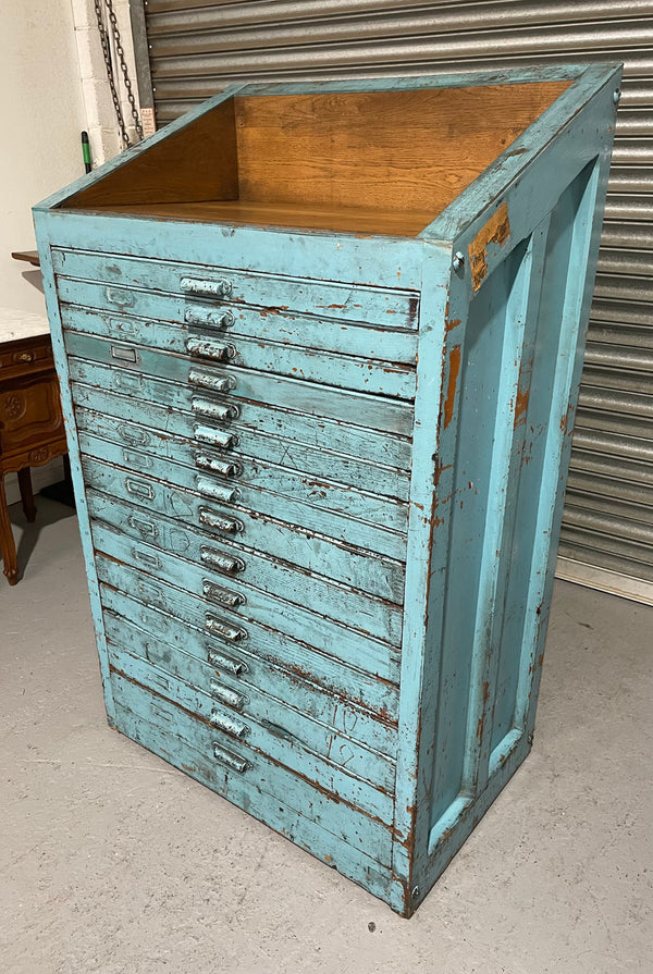 Fabulous set of vintage painted blue printers drawers that have adjustable separators which can be taken out for large papers. The drawers are various sizes and there is a section on top for working on or for storing brushes or tall items . These would be perfect for artists or jewellery pieces or even architects. Such a beautiful piece of industrial furniture.