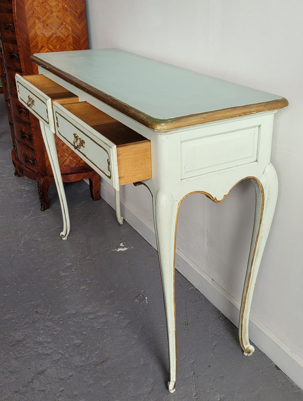 Vintage French Louis 15th style original painted and gilded highlights two drawer console table. It has been sourced from France and is in good original condition.