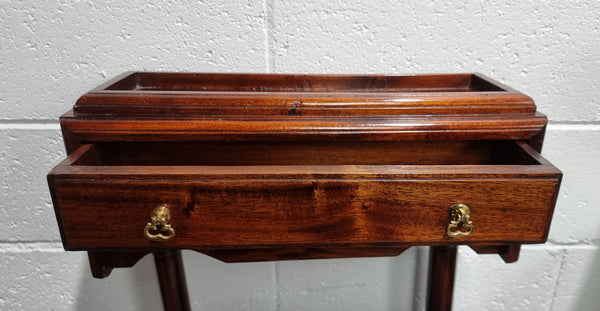 Very useful reproduction Mahogany valet stand in good condition.