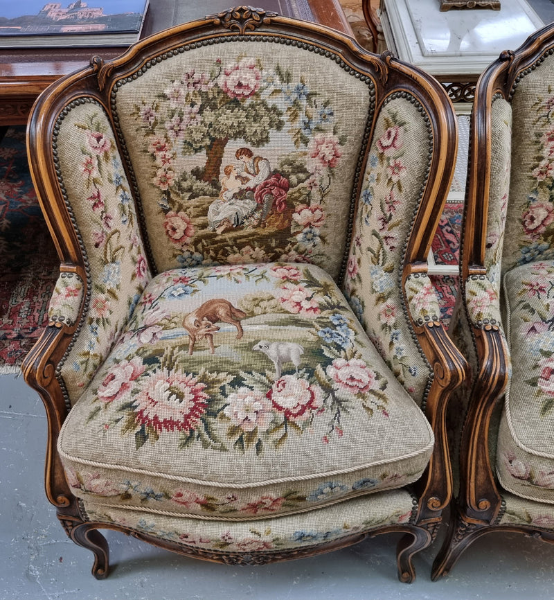 Pair of amazing French Walnut tapestry covered armchairs. The tapestry is in very good condition, please view photos as they form part of the description. Sourced from France and is in good original detailed condition.