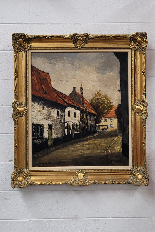 Dutch signed oil on canvas depicting village street in a beautiful gilt frame. It is in good original detailed condition and has been sourced from France.