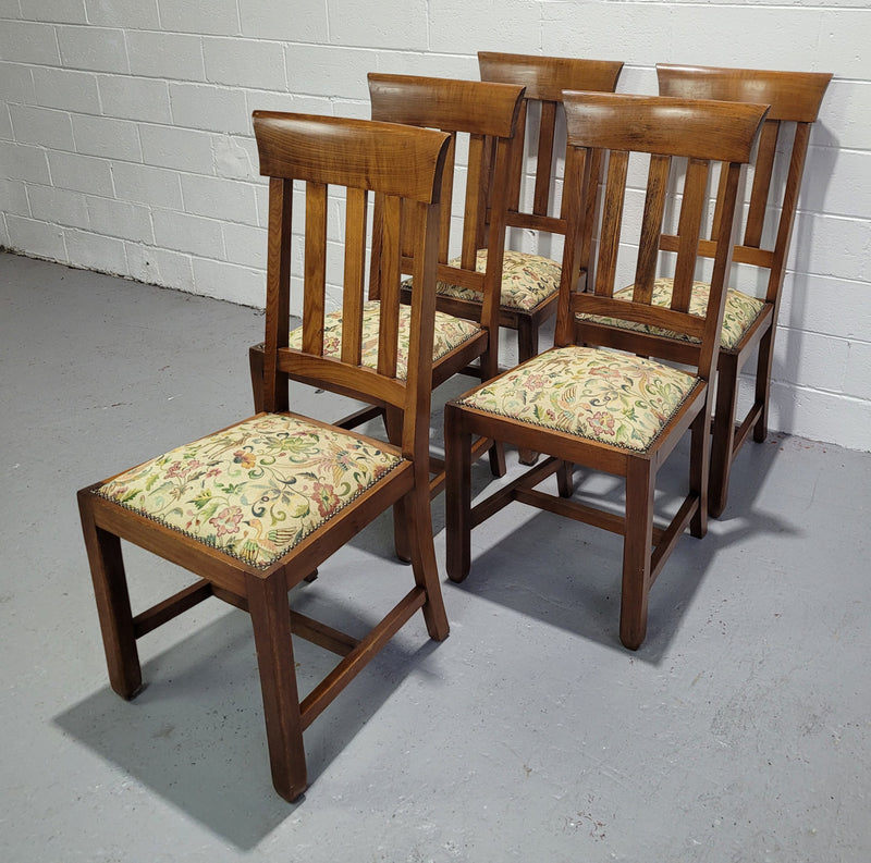 Five Blackwood dining chairs with upholstered seats. They are in good original condition including the upholstery.