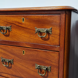 Pair of English Victorian Mahogany bedside drawers. In good original detailed condition.