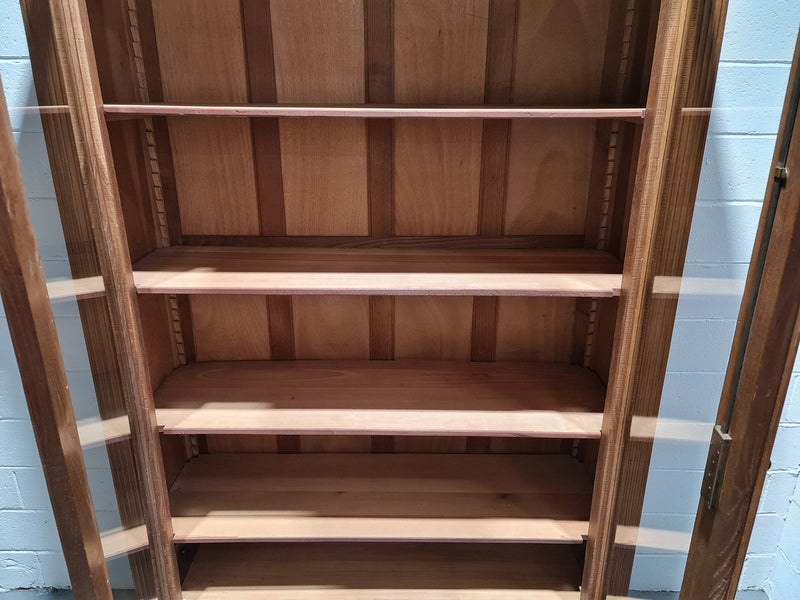 Stunning French Henry II style Walnut two door bookcase. In good original detailed condition.