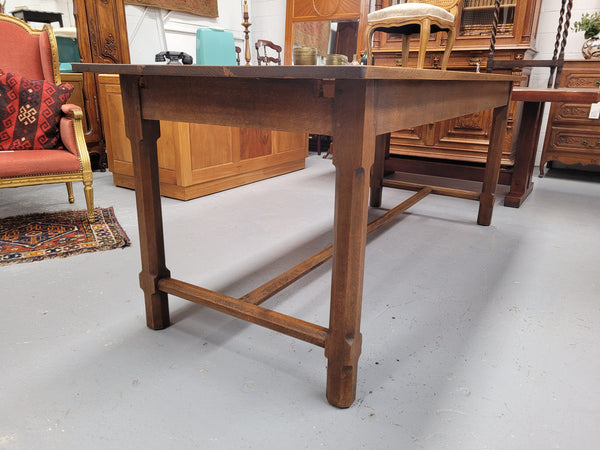 Stunning French oak stretcher base table, that has been sourced from France. It is in good original condition. Please see pictures to form part of the description.