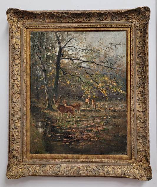 Charming oil painting on canvas depicting a forest scene and deer in an ornate gilt frame. In good original detailed condition.