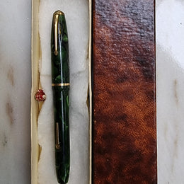 Conway Stewart  "Dinkie" 550 fountain pen green and black marble with 14k gold Nib .