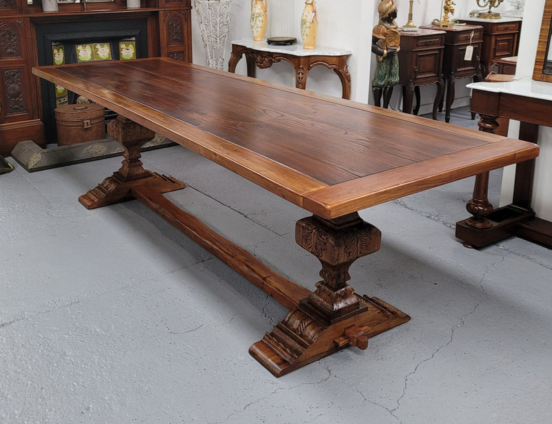 French style reclaimed Elm Farmhouse table with stretcher base and amazing carving underneath. Table can sit 10-12 people and is in good original detailed condition.