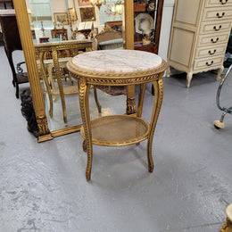 Stunning Louis XV style two tier marble topped gilt lamp/side table. It has been sourced from France and is in good original detailed condition.