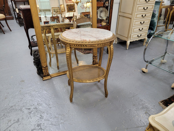 Stunning Louis XV style two tier marble topped gilt lamp/side table. It has been sourced from France and is in good original detailed condition.