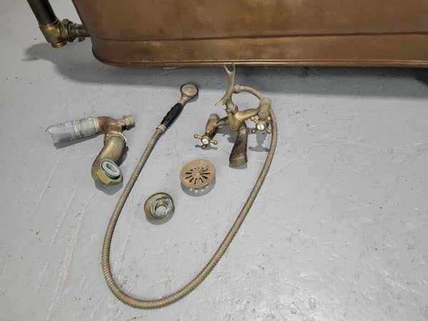 Sourced from France a rare full copper Antique bath tub on feet and includes an overflow, fittings, taps ect. In good original condition.