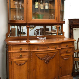 French Oak parquetry top sideboard with a glass top section for displaying and three cupboards and drawers for all your storage needs. Lovely carved details and is in good original detailed condition.