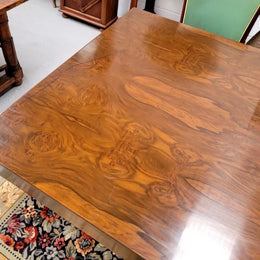 French Art Deco Figured Walnut dining table and six chairs. This stylish table also comes with a glass top and can be used with or without it. The chairs are very comfortable and the table can also fit another two chairs at either end making it a 6-8 seater. The table is in good original detailed condition with character marks to the top of table as shown in the pictures. This table and six chairs have been sourced locally.