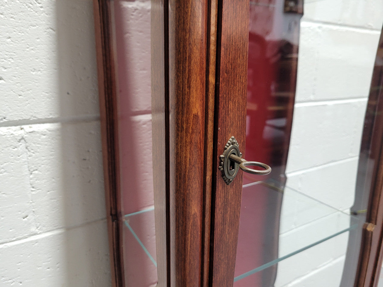 French Louis XV style compact display cabinet with marble top. It is of pleasing proportions with a lovely maroon fabric back and two glass shelves. In good original detailed condition.