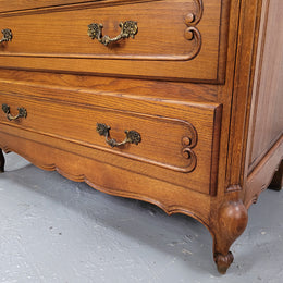 French Louis 15th style Oak three drawer chest of drawers with wooden top. It has been sourced from France and is in good original detailed condition.