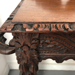 Superb 19th Century Gothic style hall/console table. It has umbrella and walking stick holders on both sides. In good original detailed condition.