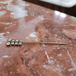 A simple but elegant vintage rhinestone hat pin . It is in good original condition, please view photos as they help form part of the description.