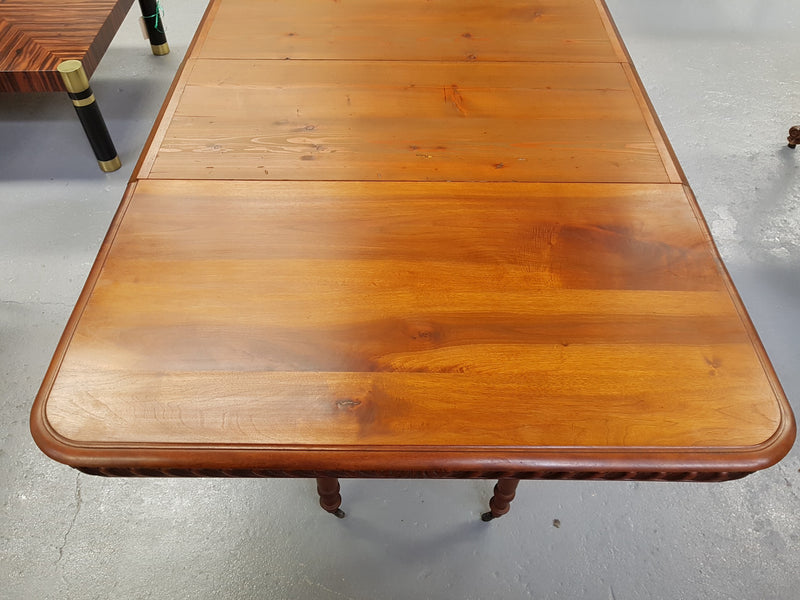 Henry II Style Walnut extension dining table. The table pulls out and it has two pine extension leaves that can be added to extend the table up to an extra 101 cm long. Tabletop and pine extension leaves are in good original condition with a wax finish.